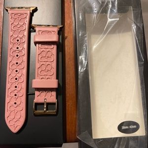 Pink coach Apple Watch band used